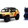 Toyota FJ Cruiser #938 W/ Extra Wheels, Yellow - Jada Toys 33028 - 1/24 Scale Diecast Car